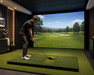 Auto Tee in use in a home golf simulator on platform