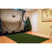 The Net Return Pro Turf - with hitting net in bedroom setup